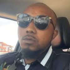 He looks like George Jefferson son or something