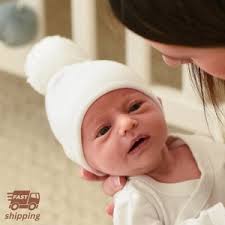 Handknit White Baby Hat With White Pom Pom