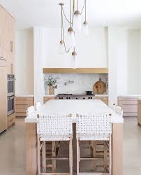 Another pragmatic kitchen decorating idea is adding a chalkboard to jot down notes, events, grocery lists or recipes, as well as a big calendar that the family can all contribute to. Modern Farmhouse Kitchen White Oak Kitchen Home Austin Kitchen