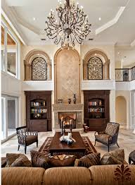 Family Room With High Ceilings And Old World Charm Familyroomdesignwithfireplace Tuscan Living Rooms Family Room Design Family Room