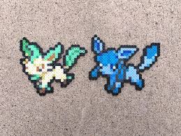 Eeveelutions Eevee Vaporeon Jolteon Flareon Umbreon Etsy Pokemon Bead Umbreon And Espeon Perler Bead Art