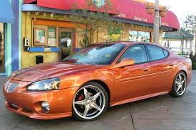 Image result for Sunburst Orange 2004 Pontiac