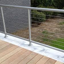 Capture the elegance of a european estate by trimming stone steps with a wrought iron railing, then topping it with a wood handrail stained to match your front door. Exterior Wrought Iron Railings Outdoor Wrought Iron Stair Railings