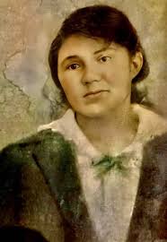 This is my aunt Cora. This picture was taken back in the 1920s. She was a  classic country aunt who won blue ribbons for her quilts and preserves at  the country fair.