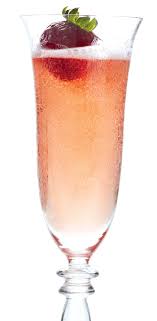 Two glasses of champagne with gas bubbles. Christmas Cocktail Recipe Festive Fizz Chatelaine