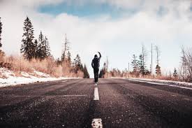 The things that you avoid with female shoots are the things that can make the model look too masculine, which are precisely what you want to emphasize with males. Man In A Winner Pose Walking On The Road Free Stock Photo Picjumbo