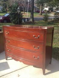 I used white spray paint, and it had pooled unattractively and unevenly across the surface. How To Paint A Dresser In 10 Easy Steps Thrift Diving Blog