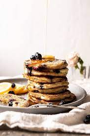 Blueberry Lemon Ricotta Pancakes Half Baked Harvest Recipe Lemon Ricotta Pancakes Ricotta Pancakes Food
