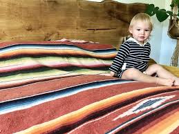 Maybe you would like to learn more about one of these? Antique Cotton Serape Saltillo Mexican Blanket Woven Cotton Muted Rainbow Striped Mexican Bedspread 37 X 79 Multicolored Coverlet Mexican Blanket Woven Blanket Saltillo