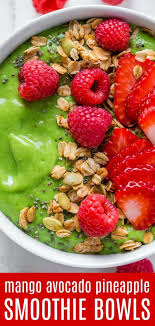 A Healthy Green Smoothie Bowl Packed With Mango Pineapple Avocado And Spinach These Smo Green Smoothie Bowl Recipe Green Smoothie Bowl Smoothie Bowl Healthy