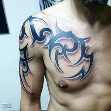 Amazing hawaiian tribal tattoo on left chest and shoulder. 50 Tribal Chest Tattoos For Men Masculine Design Ideas