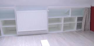 We also had room for storage at the top due to the sloped ceilings and block shelving for shoes. Sloped Ceiling Storage For My Daughter S Bedroom Ikea Hackers