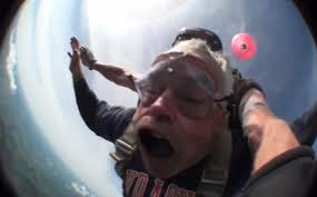 I was just glad there wasn't any birds up there!' The hilarious footage of  60-year-old dubbed 'Carp Man' after mouth fills with wind during skydive