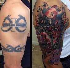 When covering a tattoo, the new tattoo is always going to be bigger; Mens Cover Up Tattoos