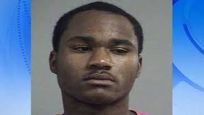 1 charged, 3 being sought in robbery of man