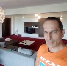 Soba noodles deliveryman in Tokyo, 1935. Being a noodle delivery man  required a special technique of stacking towers of food