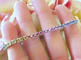 Check spelling or type a new query. Round Rainbow Sapphire Tennis Bracelet With Prong Setting In 14k White Gold Gb 4043