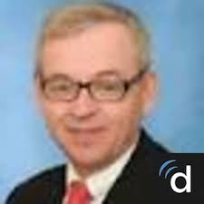 Dr. Chris J. Dickinson, MD