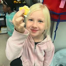 We learned about Pioneers and what their Thanksgiving may have been like.  Then we made butter by hand like the pioneers with kindergarten. 4th grade  shared what they learned about the pioneers