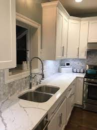 Ft./case) true gray 3 in. Calacatta Laza Quartz Countertop Hexagon Backsplash Kitchen Remodel Small Kitchen Wall Tiles Design Kitchen Room Design