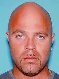 ARREST IN KILLING OF DOCTOR'S WIFE