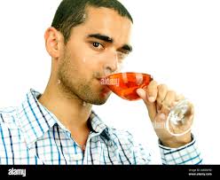 Model drinking wine hi-res stock photography and images