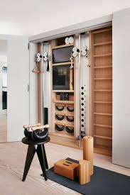 Like Hidden Equipment In Closet Storage And Built Ins Gym Room At Home Home Gym Design Gym Room