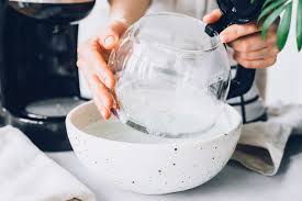 Run a half brew cycle. How To Clean A Coffee Maker