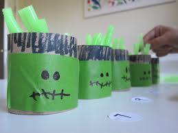 Using a black background really makes the little ghosts stand out, and you can create an entire ghost family. 50 Halloween Craft Ideas For Preschool No Time For Flash Cards