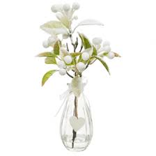 Carnations, daisies, irises, lilies, orchids, roses, sunflowers Christmas Flower Arrangements White Snow Berries In Clear Glass Vase
