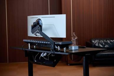 Effective cable management is the backbone of a clean desk setup., AI generated