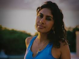 Decolonizing Yoga: Omwashing & Collective Liberation