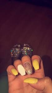 But if you are choosy while picking up the this is a unique representation where you can wear natural, glitter, 3d arts nails all at a time. Acrylic Nails Yellow White Sparkles Acrylic Nails Yellow Yellow Nails Yellow Nails Design