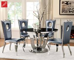 The Blasio Collection Transforms Your Dining Room In The Hollywood Bling Glam Style The Metallic Grey Chairs And Black Tempered Glass Table Top Truly Make It