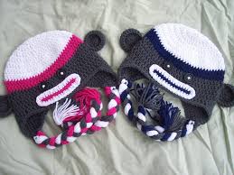 Knitting little hats to raise money to help keep older people warm in winter. Free Crochet Pattern For Child Size Sock Monkey Hat Crochet Sock Monkeys Crochet Hats Crochet