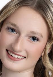 How to preserve freckles in Evoto AI photo editing?