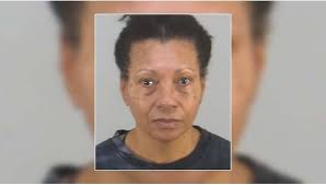 Gertrude Lawrence with her standard schnauzer in 1920