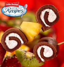 With all the extra inspiration coming my way however, i feel the need to harness the overload of ideas into a few solid hostess home runs. Little Debbie Swiss Roll Kebabs Recipe Kebab Recipes Franks Recipes Swiss Roll
