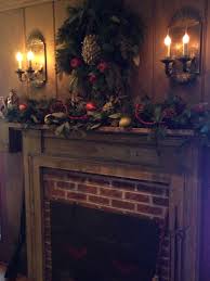 Your colonial christmas stock images are ready. Fireplace Decorated In Early Colonial For Christmas Christmas Mantel Decorations Primitive Christmas Decorating Primitive Christmas