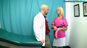 BoundHub - blond nurse gives handgag handjob with pink latexgloves