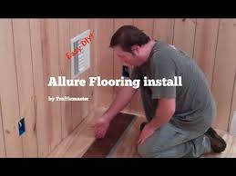 Gonna need about 400 sq/ft done. Allure By Trafficmaster Flooring Install Grip Strip Planking Youtube