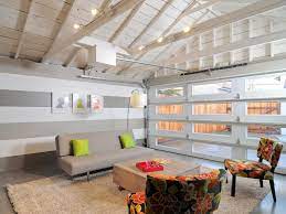 And then, a bonus garage conversion! Striped Living Room In Converted Garage Garage To Living Space Convert Garage To Bedroom Garage Bedroom