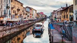 An artificial waterway or artificially improved river used for travel, shipping, or irrigation. Milan Italy S Lost City Of Canals Bbc Travel