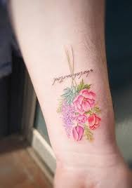 Similarly, floral tattoos can carry a very personal and meaningful message, or can simply exist because you enjoy their beauty. Small Rose Bouquet Tattoo Elegant Arts Tattoo