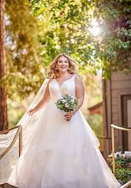 Tulle skirt with chapel trail that has a wrist tie to elegantly hold your train while you dance and enjoy your night. Basque Waist Wedding Dresses The Knot