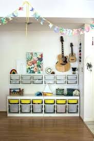 Ikea Trofast Storage Ideas Playroom Ideas Shared Spaces A Former Dining Room Turned Storage Area Kids Bins Storage Kids Room Ikea Kids Playroom Ikea Kids Room