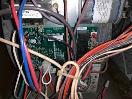 In the picture you can see the 3 blue wires coming off the 24v side of the transformer. Where To Attach The C Wire Inside Goodman Gmp100 4 Furnace Home Improvement Stack Exchange