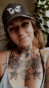 Tattoo by @tattoosbylefty . Orange Lilly and blue flower below are healed