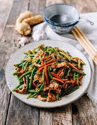 Trim the end and bud, toss with oil, salt, and pepper, and pop the whole scapes on the grill over a medium flame. Chinese Garlic Scapes Stir Fry With Pork The Woks Of Life