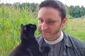Stray kitten surprises local priest during virtual Sunday service